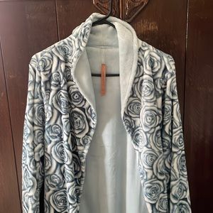 Soft and cozy NWT bathrobe.